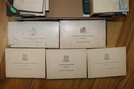 A collection of cased Franklin coin sets
